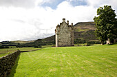 Drystone wall and castle exterior Scotland UK