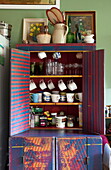 Upcycled storage dresser in kitchen of London home England UK