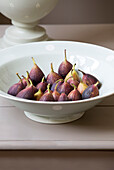 Figs in ceramic bowl Sussex Downs home England UK