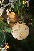 Jewelled bauble on Christmas tree in Berkshire home,  England,  UK