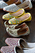 Oriental slippers in Sussex farmhouse   England   UK