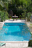 Swimming pool in grounds of Var farmhouse Provence France