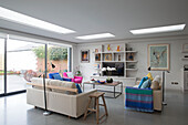 Modernised living room with skylights in Victorian cottage Sussex England UK