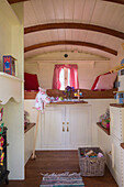 Traditional gypsy wagon used as a childrens playhouse Sussex UK