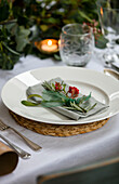 Cut flower on place setting at Christmas in West Sussex home UK