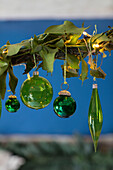 Christmas foliage and green bauble decorations in Grade II listed Hampshire cottage