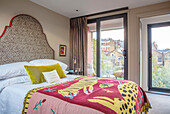 Safari themed bedroom with view of South London UK