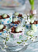 Easter Table setting with chocolate crunch in pretty floral papercases