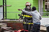 Firefighters battling a house fire