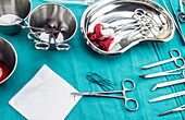 Surgical instruments and swabs on a tray