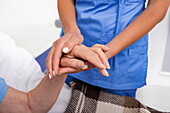 Nurse caring for senior woman