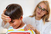 Child undergoing a physical examination
