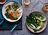 Chinese rice noodles with vegetables and bok soy with cashew nuts