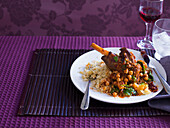 Moroccan leg of lamb with couscous and chickpeas