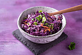 Vegan red cabbage coleslaw with carrots and spring onions