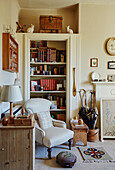 Reading area next to bookshelf in a country house