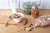 Breakfast muesli with pomegranate seeds and almonds