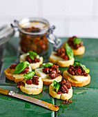 Canapes with cheese and chorizo jam