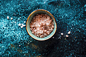 Salt seasoning on dark marine color concrete background