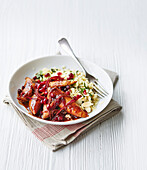 Pomegranate chicken with almond couscous