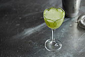 A cucumber cocktail with garnish