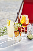 A selection of summer drinks on a table outdoors