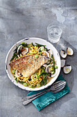 Sesame-crusted fish with samphire and clams