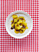 Porridge with apple and raisin compote