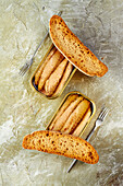 Tinned mackerel preserved in oil served with toasted bread