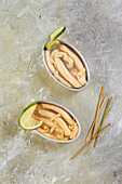 Canned razor clams with lime