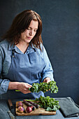 Christine Mayr (Portrait) with winter vegetables