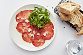 Bresaola with shaved truffle and a rocket salad