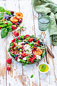 Berry burrata salad with basil and fried apricots