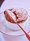 Chocolate soufflé with spoon