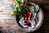 Fresh beetroot in a wooden bowl