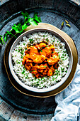 Tandoori chicken with yogurt sauce and spiced rice