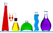 Liquids in different shaped vessels
