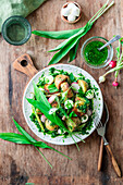 Potato salad with asparagus, radish and wild garlic pesto