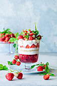 Strawberry trifle with strawberry jelly, vanilla sponge and yogurt cream