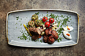 Mixed grilled meats with yoghurt
