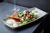 Labneh with salad and crispy flatbread