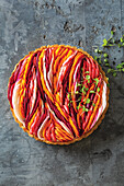 Vegetable tart with colorful pickled root vegetable