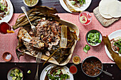 Slow roasted Mexican lamb in banana leaves