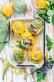 Round zucchini and summer squash stuffed with meat and pearl barley