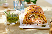 Puff pastry and salmon strudel with leeks