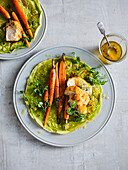 Green pea pancakes with baked carrots and chicken