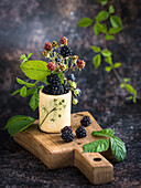 Fresh blackberries in a jar