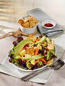 Cauliflower salad with avocado and tortilla chips