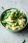 Easy mashed potatoes with mustard seed and arugula