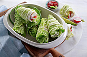 Spring cabbage wraps filled with chicken and vegetables